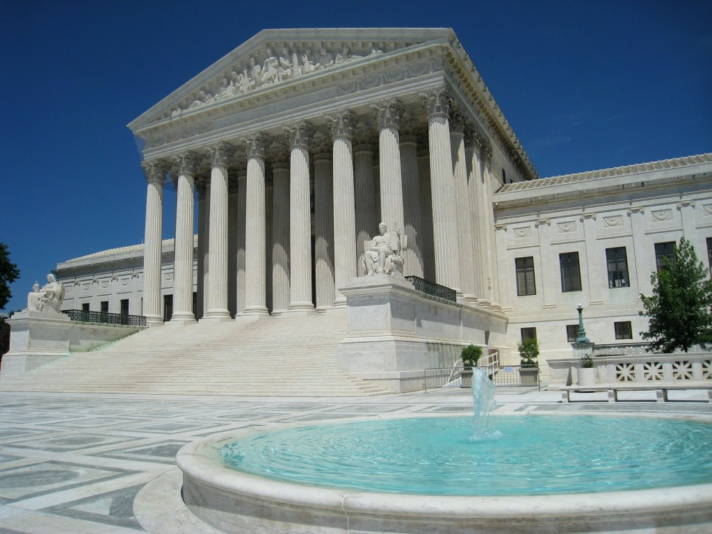 Supreme Court rules that a conviction for obtaining naturalization